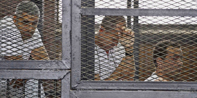 Egypt sentences three Al-Jazeera journalists to seven years in prison